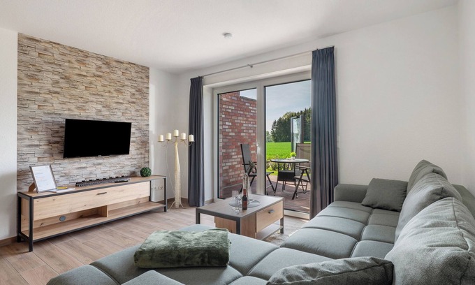 Lastrup Apartamento | Apartamento vacacional 'Anna 1 Eg' con terraza privada y jardín