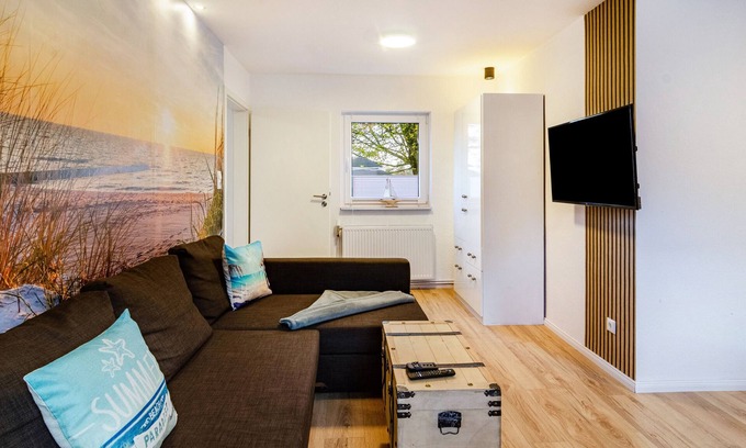 Altengroden Apartamento | Apartamento vacacional 'Wellenrauschen' con jardín, terraza, bañera de hidromasaje y Wi-Fi