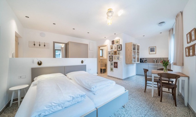 Merano Apartamento | Apartamento vacacional "Domus Faber 4a" con vistas a la montaña, terraza compartida y Wi-Fi