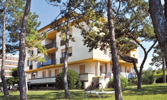 Bibione Apartamento | Apartamento vacacional Con solarium y chimenea exterior.