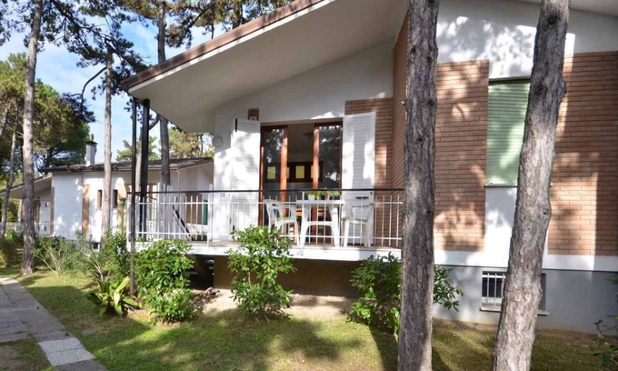 Lignano Pineta Apartamento | Apartamento vacacional con garaje privado que incluye paquete de playa