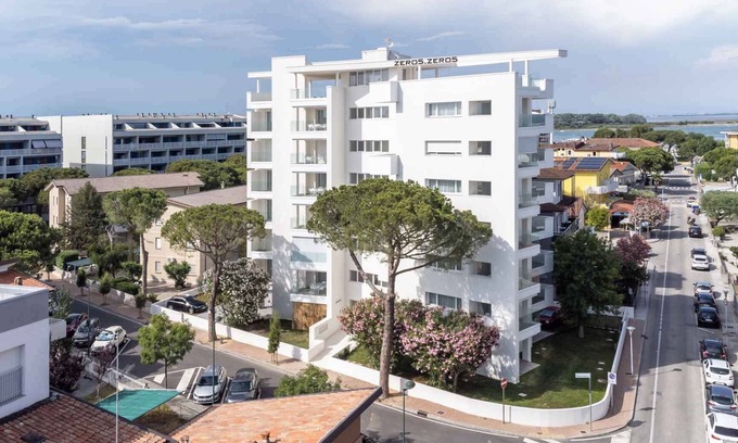 Lignano Sabbiadoro Apartamento | Apartamento vacacional con lugar de playa y aire acondicionado