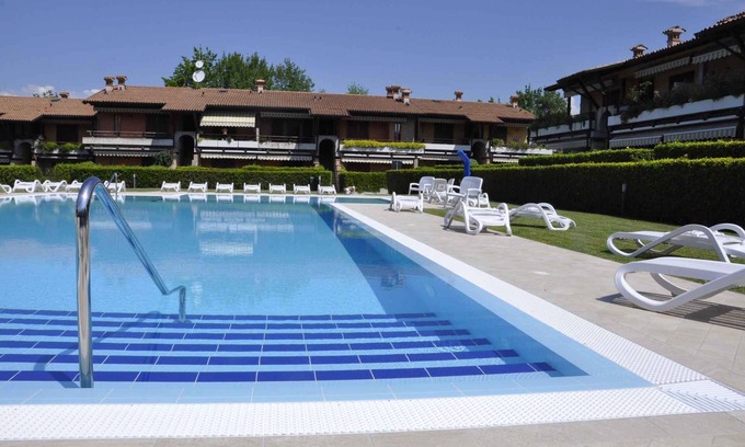 Montioni Apartamento | Apartamento vacacional cerca del centro con piscina, aire acondicionado, parking