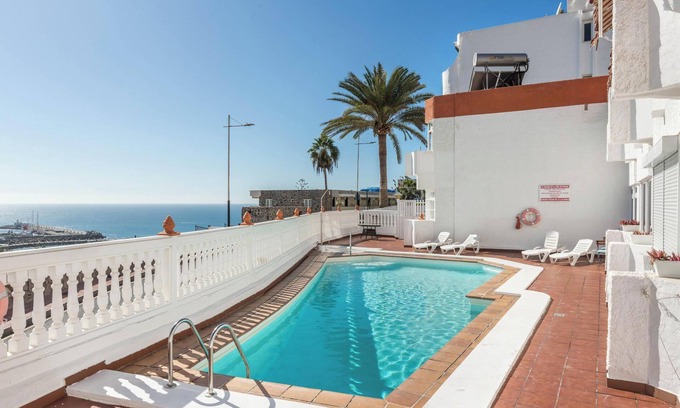 Puerto Rico Apartamento | Apartamento vacacional 'Sweet Home' con aire acondicionado, terraza y piscina compartida