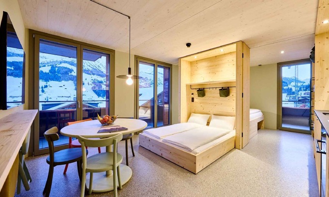 Adelboden Apartamento | Holiday apartment with balcony and ski room