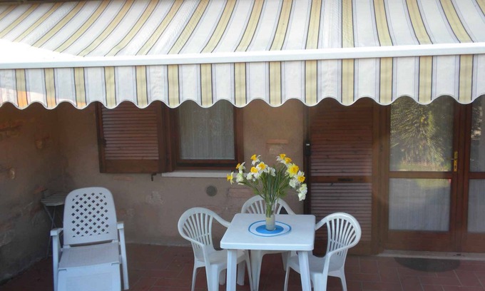 Montioni Apartamento | Apartamento vacacional con jardín privado en una ubicación conveniente al lago