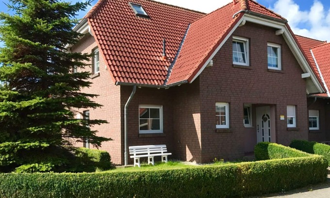 Carolinensiel Apartamento | Holiday home family and dog