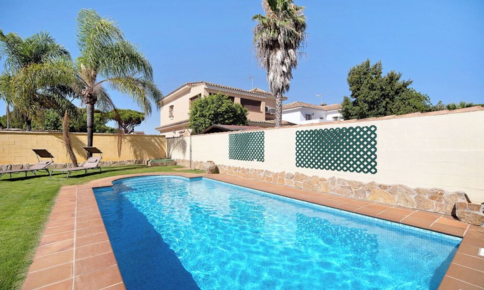 Los Gallos-Cerromolino Casa | Casa de vacaciones 'Chalet Con Piscina En La Barrosa' con piscina privada, terraza privada y Wi-Fi