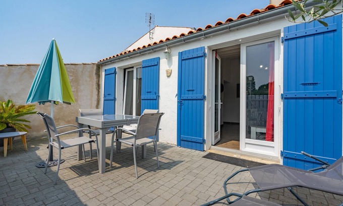 Le Grand-Village-Plage Casa | Casa de vacaciones "Pied à Terre" con terraza privada