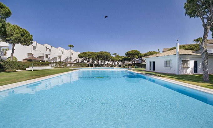 Poblado de Sancti Petri Apartamento | Casa de vacaciones 'Apartamento El Marinero' con piscina compartida, Wi-Fi y aire acondicionado