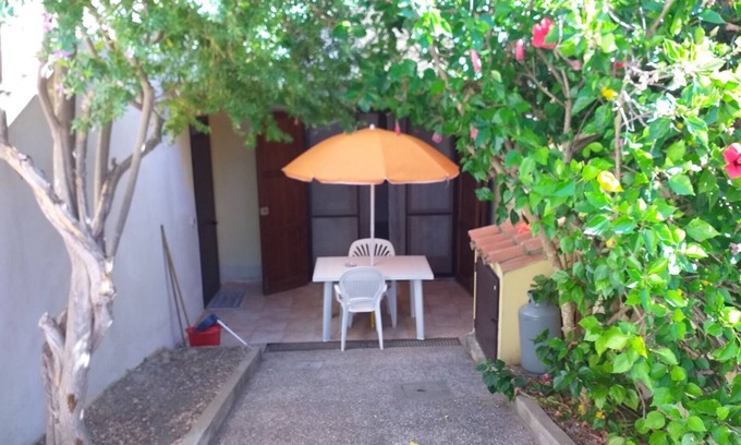 Funtana Meiga Casa | Holiday Home 'Casa Funtana Meiga' close to the Beach with Sea View, Shared Garden & Terrace