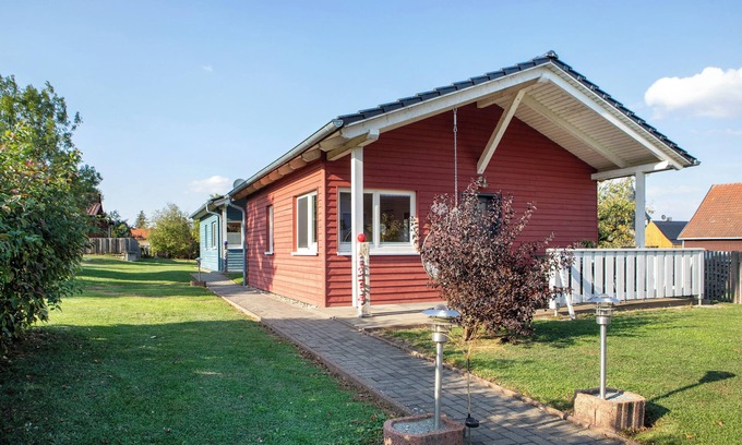 Craula Casa | Casa de vacaciones 'Ferienhaus Rot' con terraza privada, jardín privado y Wi-Fi