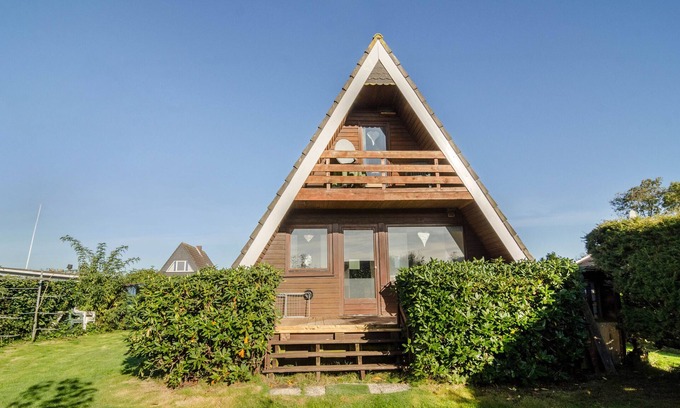 Sudbrookmerland Casa | Casa de vacaciones 'Ferienhaus Kron' con terraza compartida, jardín compartido y Wi-Fi