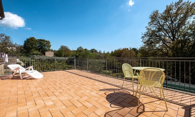 Casone Casa | Casa de vacaciones 'La Casetta Del Caminetto' con piscina compartida, jardín compartido y balcón