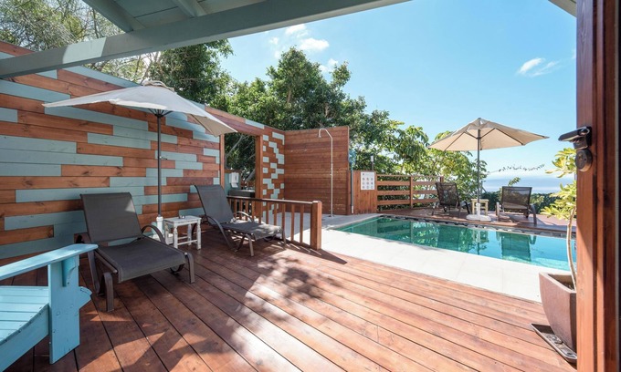 Tejina Casa | Casa de vacaciones 'Las Hermanas II' con vistas al mar y a la montaña, piscina compartida y jardín