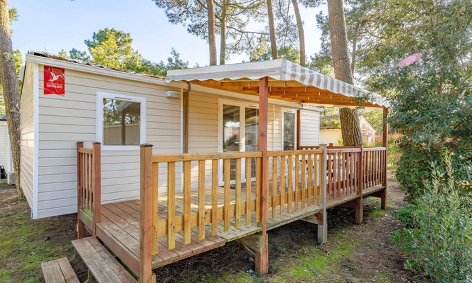 Les Mathes Casa | Casa de vacaciones 'Mobil Home La Palmyre' con piscina compartida y terraza privada