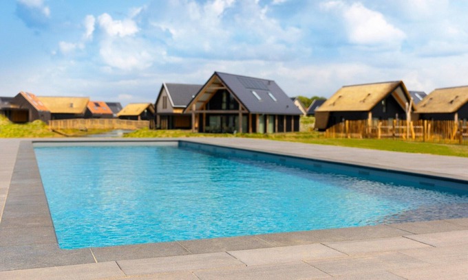 Nieuwvliet Casa | Moderna casa de vacaciones sobre el agua