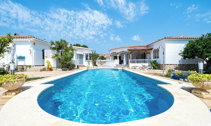 Miami Platja Casa | Casa de vacaciones "Palmera" con piscina compartida y Wi-Fi