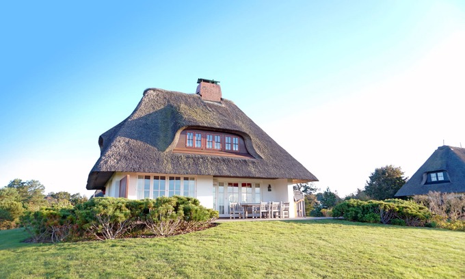 Greveling Casa | Casa de vacaciones 'Reetdachhaus' con vistas al mar, terraza privada y Wi-Fi