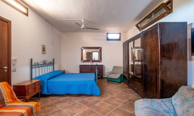 Galatone Casa | Holiday Home 'Rosso Pepe' with Private Terrace, Private Garden and Air Conditioning