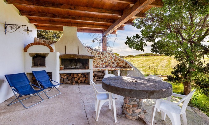 S'Archittu Casa | Casa de vacaciones 'Villa Due Archi' con vistas al mar, terraza privada y jardín privado