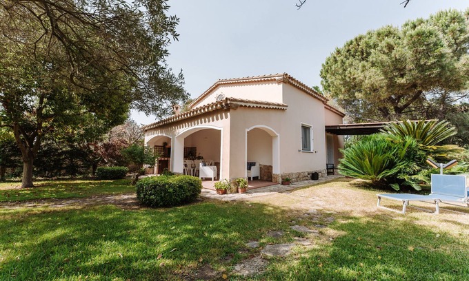 Nora Casa | Casa de vacaciones 'Villa Marilisa' con terraza privada, jardín privado y aire acondicionado