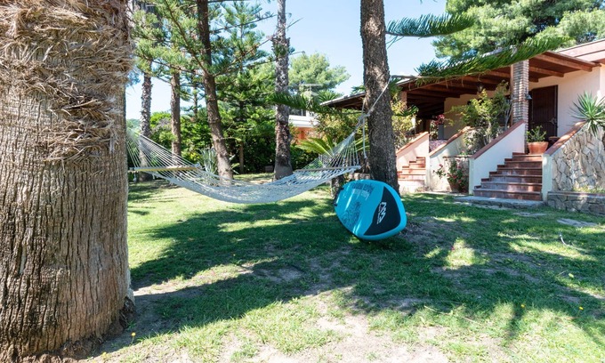 Cala Sinzias Villa | Encantadora casa con aire acondicionado, jardín y terraza; Estacionamiento disponible; Mascotas permitidas