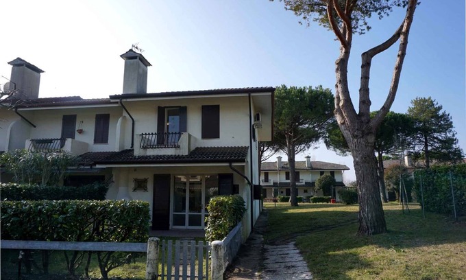 Porto Santa Margherita Apartamento | Casa vacacional Pueblo vacacional con piscina y pista de tenis.