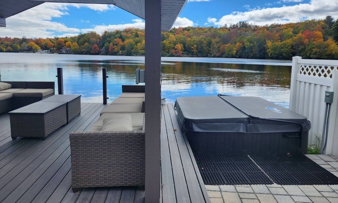 Kauneonga Lake Villa | Home king luxury, waterfront hot tub, family , indoor pool, private beach