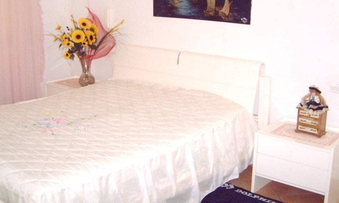 Seccagrande Apartamento | Homerez - ¡A 10 m de la playa! Espacioso apartamento para 8 pers. en Seccagrande