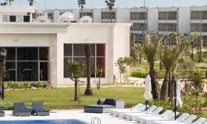 Sidi Rahal Apartamento | Homerez - ¡A 10 m de la playa! Apartamento para 5 pers. con piscina compartida