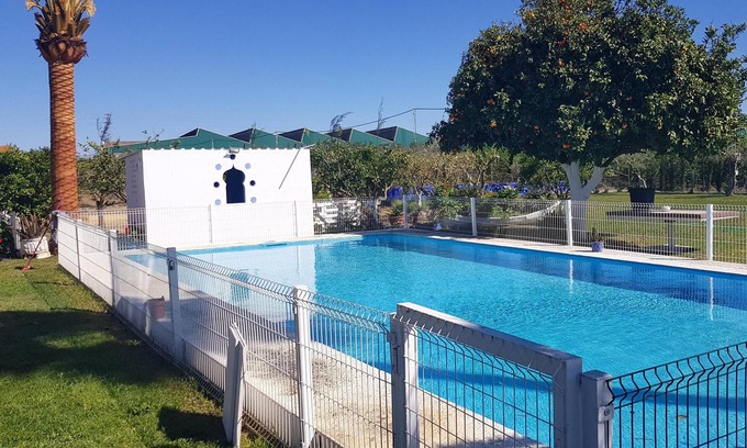 Utrera Chalet De Esquí | Homerez - Gran chalet a la montaña para 14 pers. con piscina y jardín en Utrera