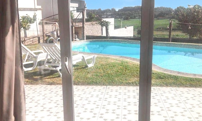 Vila Nova de Famalicao Casa | Homerez - Casa encantadora en Requião con piscina compartida