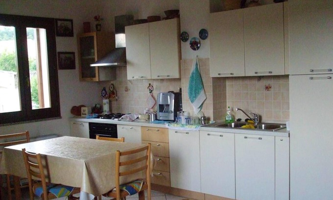 Nughedu Santa Vittoria Apartamento | Homerez - Bonito apartamento para 3 pers. con balcón en Nughedu Santa Vittoria