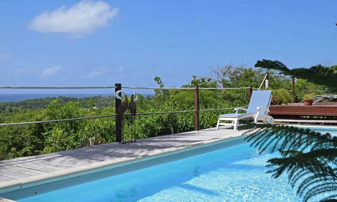 Sainte-Anne Villa | Homerez - Villa moderna con piscina en Sainte-Anne 154 m² vista al mar