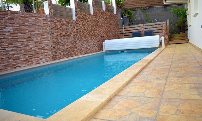 Piton Saint-Leu Villa | Homerez - Villa a 5 km de la playa para 8 pers. con piscina en Piton Saint-Leu