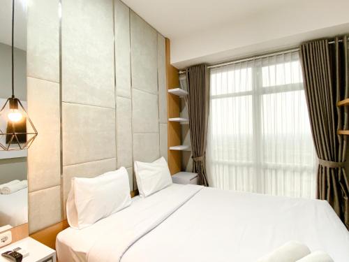 Cikarang Apartamento | Homey and Minimalist 1BR Vasanta Innopark Apartment By Travelio