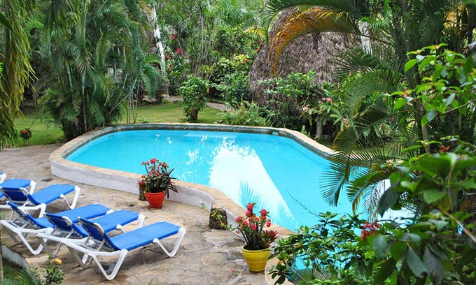 ProCab Apartamento | Hostel room with shared bathroom on tropical lagoon