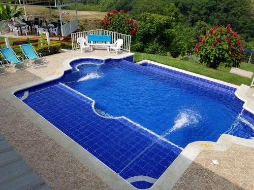 Calarca Casa | Hotel Chalet San Juan de Ticlan