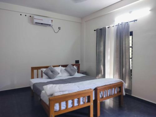 Thiruvananthapuram Hotel | Hotel O Nemom Formerly Ambadi Guest House