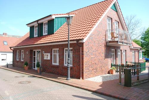 Neuharlingersiel Apartamento | Hotel und Ferienwohnung Rodenbäck
