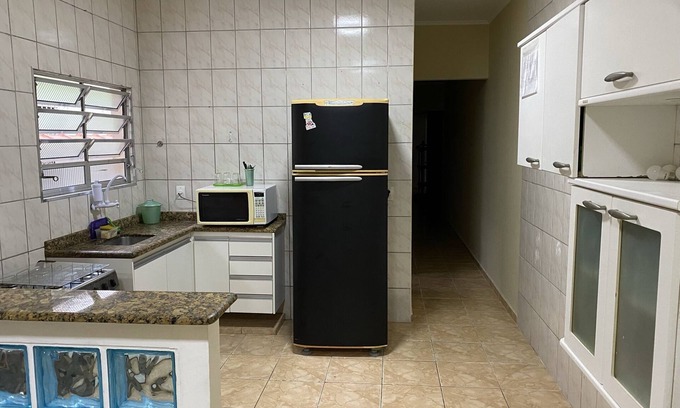Real Casa | House 4 Suites, Large Space for Barbecue for 16 people.