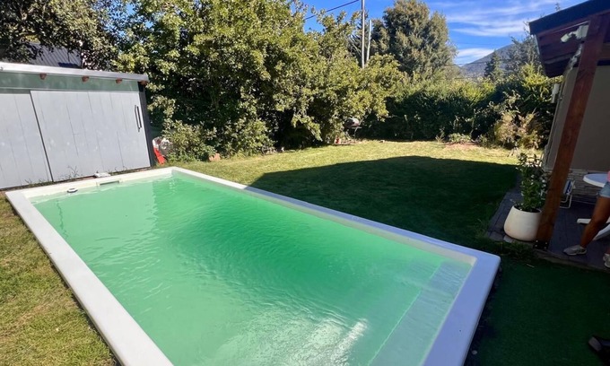 San Carlos de Bariloche Casa | casa con pileta climatizada/mesa de pool y ping pong