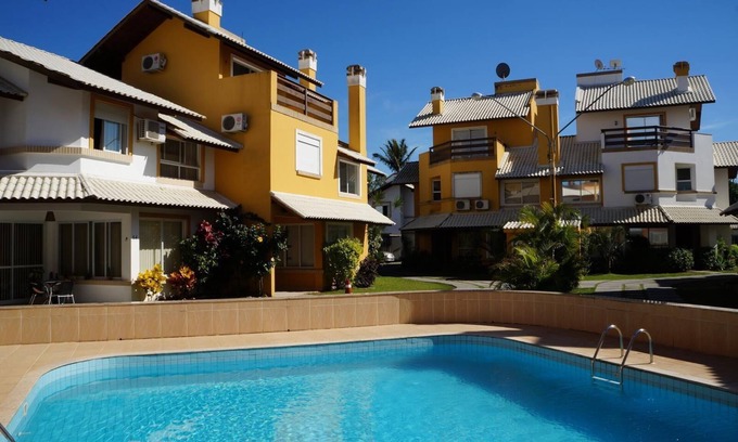 Cachoeira do Bom Jesus Casa | Casa de 4 dormitorios P / 12 Pax en condominio con amplia zona de ocio, confiera!