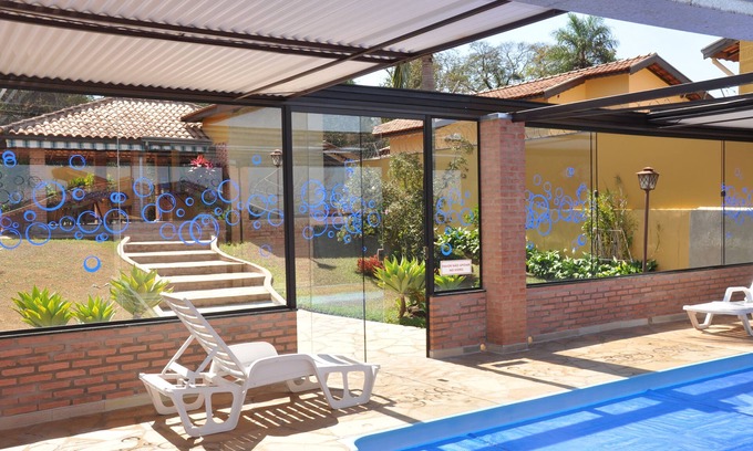 Brotas Casa | Casa con piscina climatizada y techo retráctil para alojamiento en Brotas.