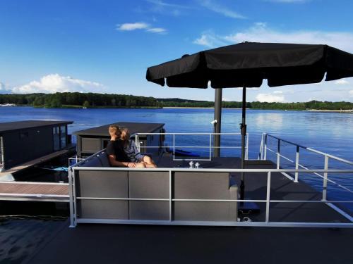 Middelaar Chalet De Esquí | Houseboat Marina Mookerplas 4-6 persons roof terrace