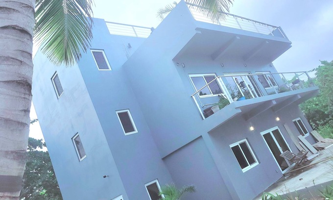San Pedro Villa | Huge modern Beach Villa dream 4 stories 360 views reef and lagoon