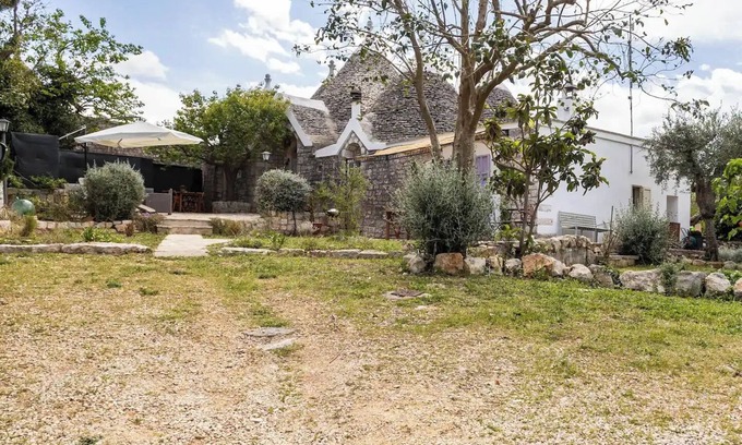 Laureto Villa | I Trulli di Zizì: Trulli antiguo en Valle D'Itria