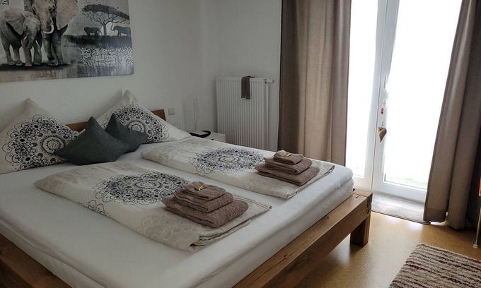 Unterallgau Apartamento | i24rooms - apartamento de 3 habitaciones. Con terraza, jardín y chimenea.