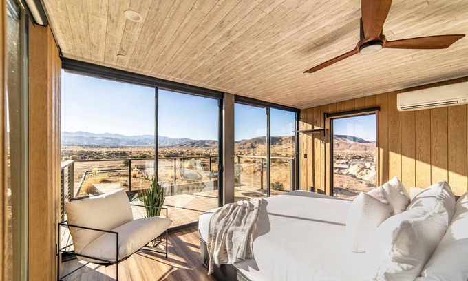 Yucca Valley Casa | Iconic 7,000sf Glass Villa + Soaking Pool